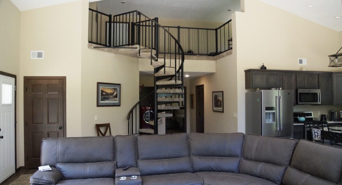 RAM 18-307 Interior looking at staircase going up to second floor from living space
