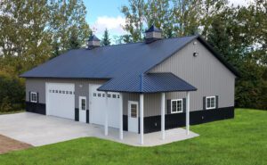 RAM 18-235 Exterior from side angle showing 2 large bifold doors, entrance, and side windows