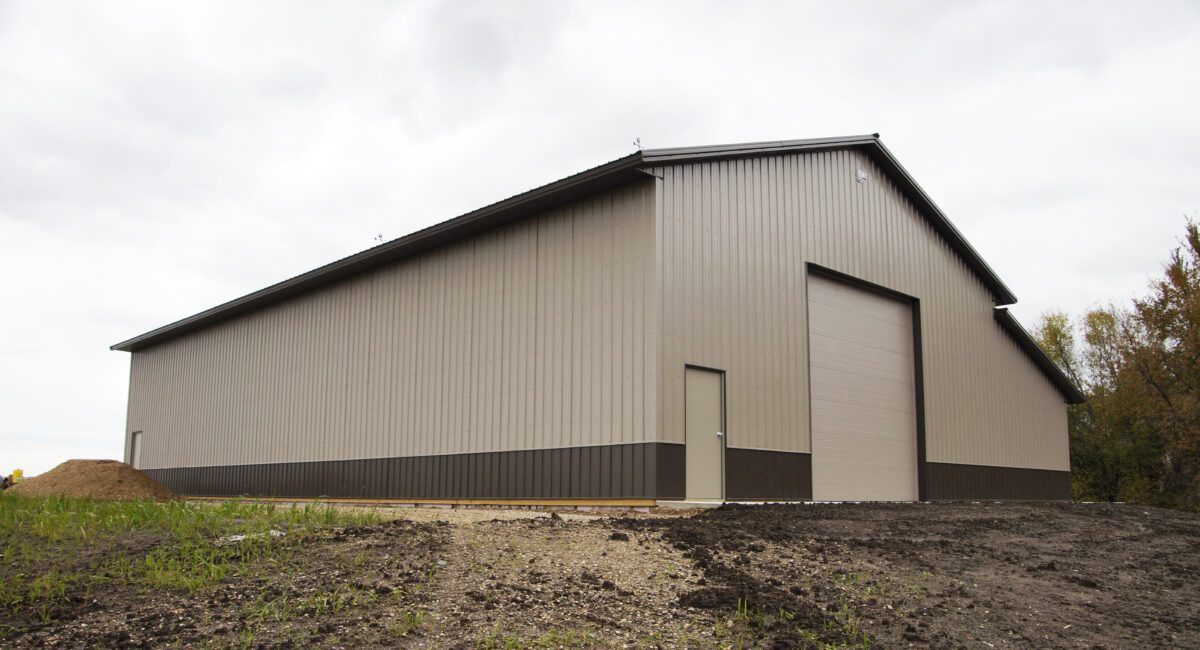 RAM 19-462 Back side with large garage and entrance doors