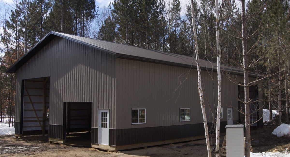 RAM 20-674 Front of building during construction phase, without 2 garage doors attached yet