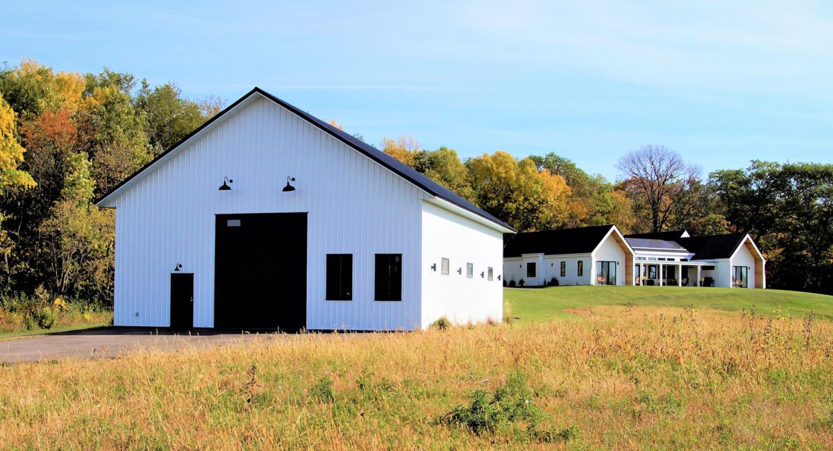 RAM 20-839 Wide angle photo of storage building in front with home in the distance behind