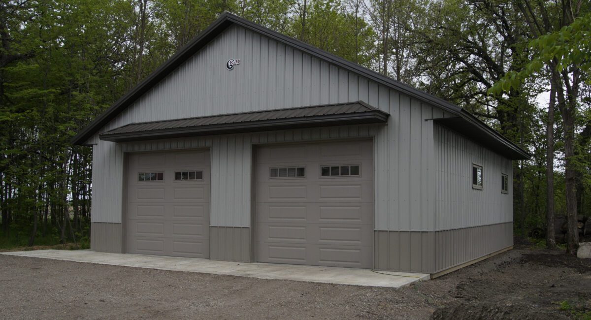 RAM 20-890 Front right angle of building shaded by trees.