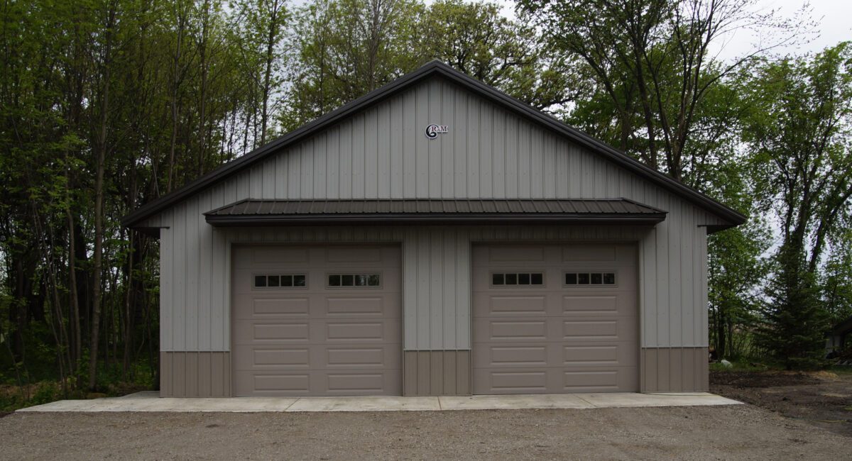 RAM 20-890 Front of building straight on showing gravel driveway.