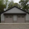 RAM 20-890 Front of building straight on showing gravel driveway.
