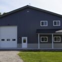 RAM 20-891 Front of building showing large garage doors and porch