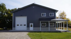 RAM 20-891 Front of building showing large garage doors and porch
