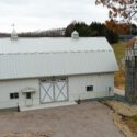 RAM 21-137 Front view of storage building with silo on right