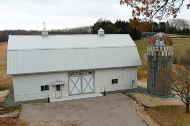 RAM 21-137 Front view of storage building with silo on right