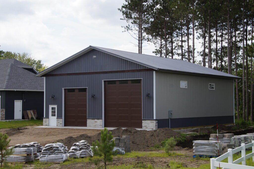 RAM 21-178 Right angle of front of building, landscaping material laid out in front
