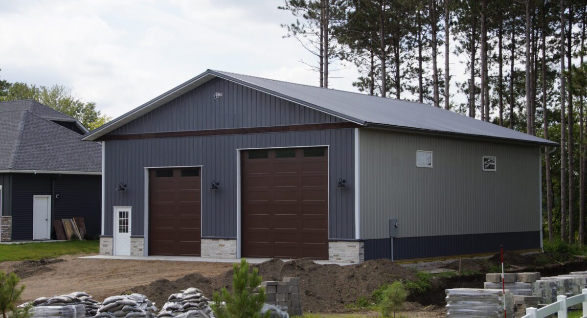 RAM 21-178 Right angle of front of building, landscaping material laid out in front
