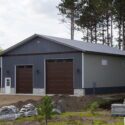 RAM 21-178 Right angle of front of building, landscaping material laid out in front