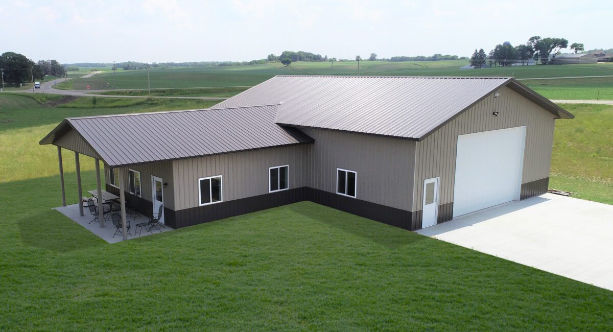 RAM 22-333 Front right view of building showing front garage door facing driveway with left side section with porch