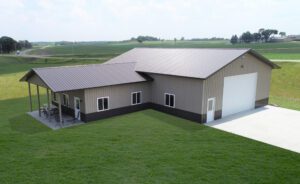 RAM 22-333 Front right view of building showing front garage door facing driveway with left side section with porch