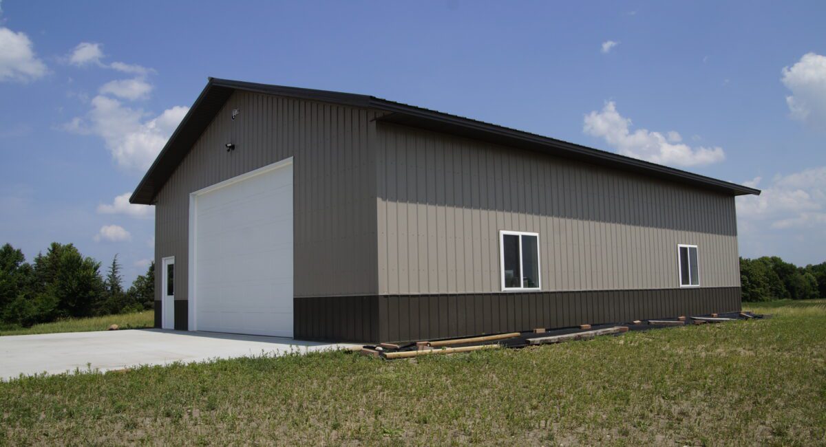 RAM 22-333 Front right view of side and large garage door facing driveway