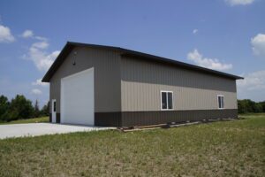 RAM 22-333 Front right view of side and large garage door facing driveway