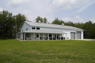 RAM 22-377 Wide angle of front of building showing large lawn