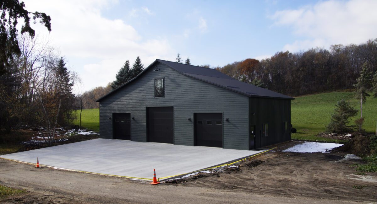 RAM 23-605 Front of building from right angle with fresh concrete drive