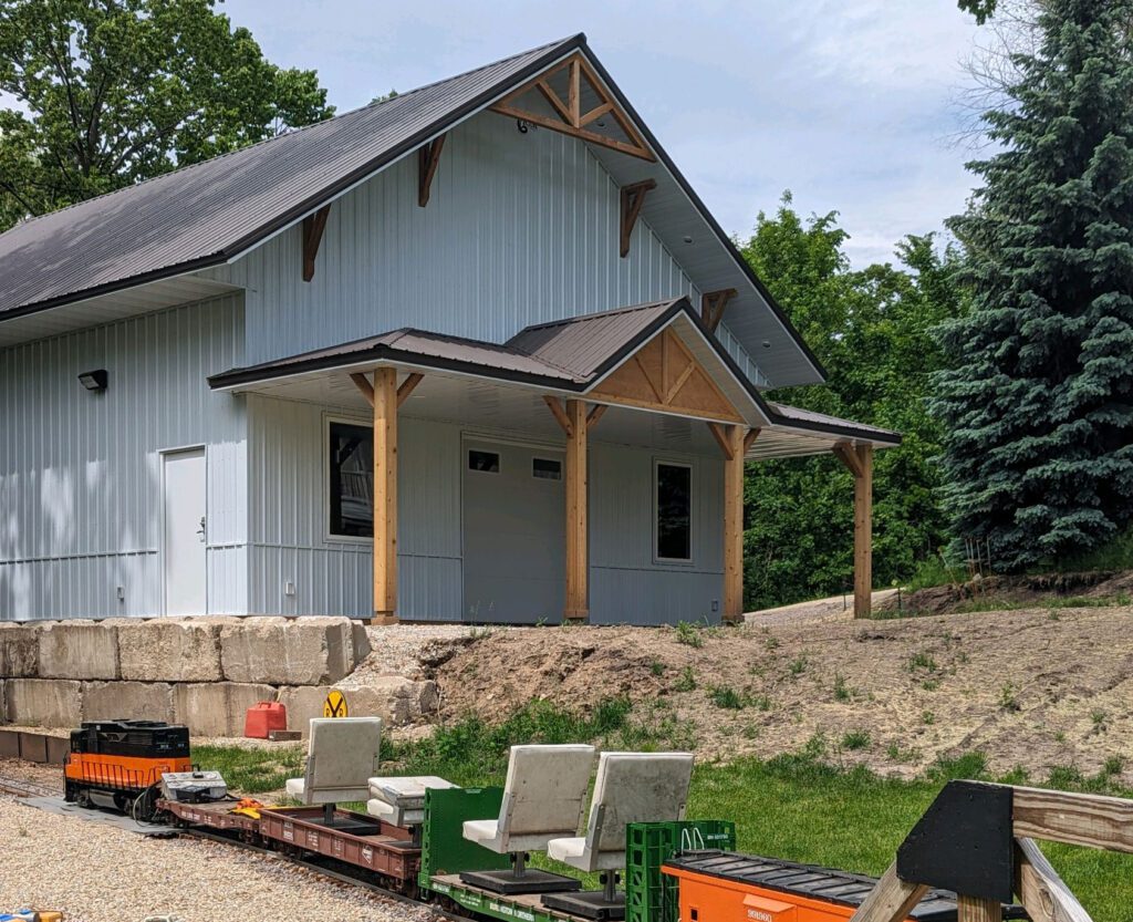 RAM 23-808 Front left angle of building with train seating in view