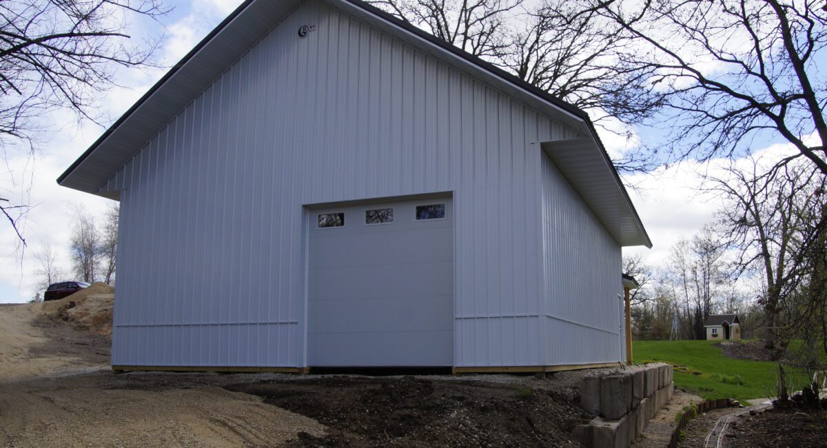 RAM 23-808 Back of building with garage door on the right side