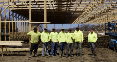 RAM Buildings construction team outside building in process